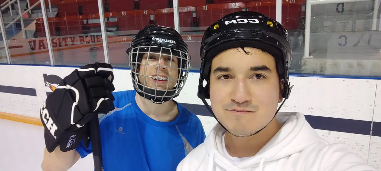 Lucas and a friend in hockey gear