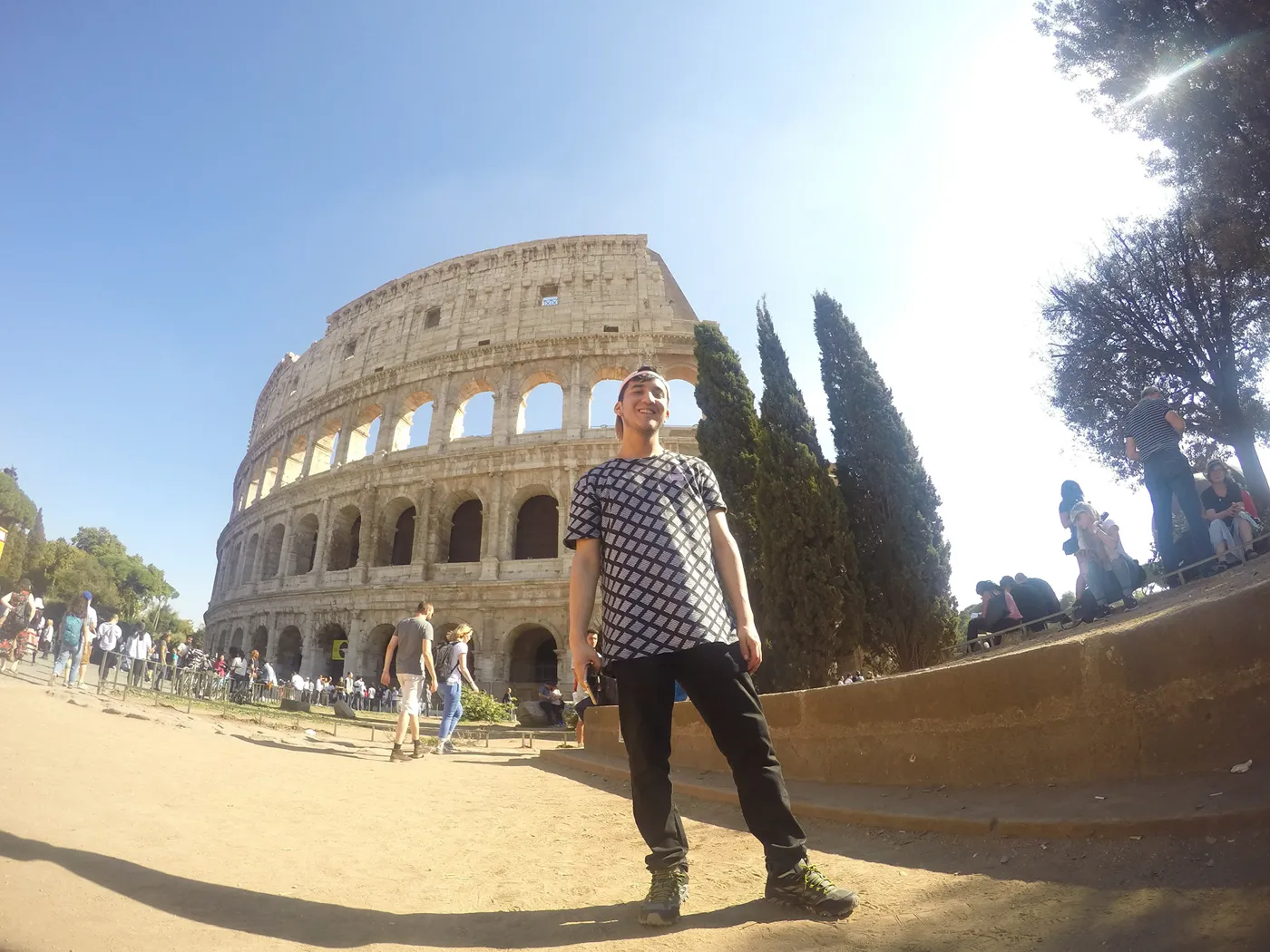 Lucas in front of the Colosseum in Rome